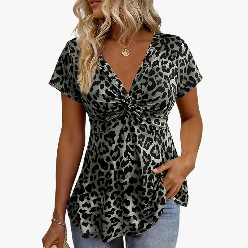 🐆 LIMITED-TIME 50% OFF! ✨ Women’s Leopard Twist-Front Top – V-Neck, Peplum Hem, Bold Print 💃